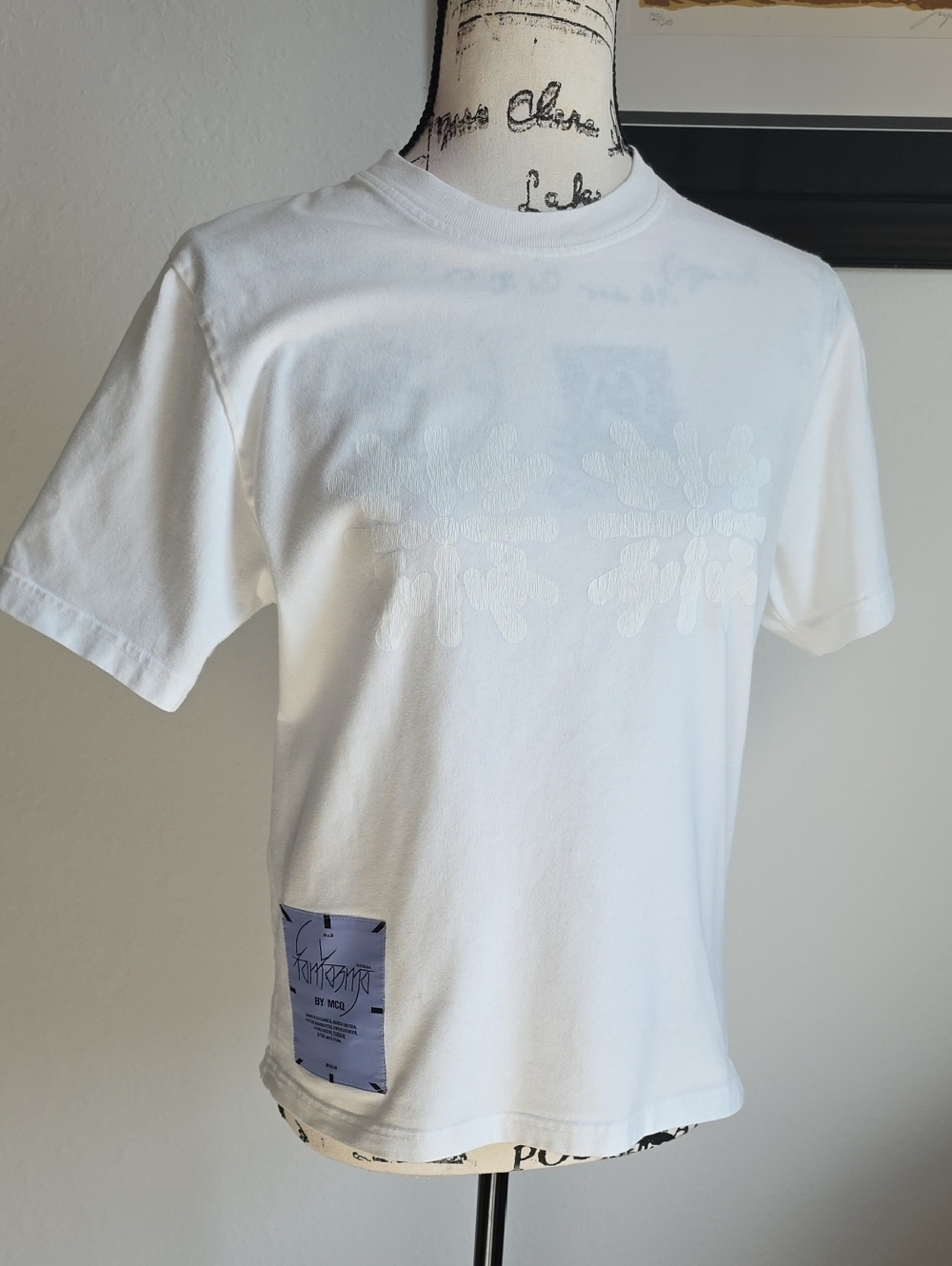 MCQ Alexander McQueen "Fantasma" graphic-print cotton-jersey T-shirt in white.